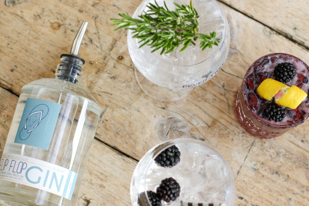 The Cliff House Flip Flop gin with two garnished glasses